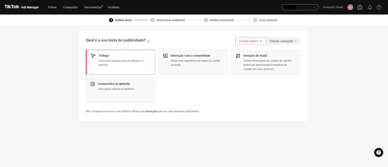 Imagem da interface do TikTok Ads Manager, mostrando opções de publicidade como Tráfego e Interação com a Comunidade. A tela destaca a definição de metas publicitárias.